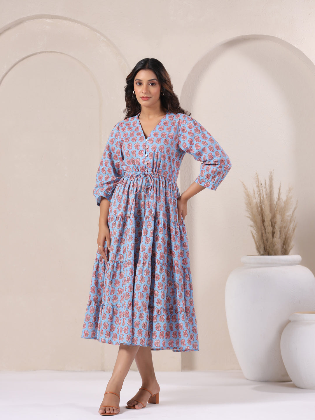 Full-length view of powder blue paisley print maxi dress for party wear