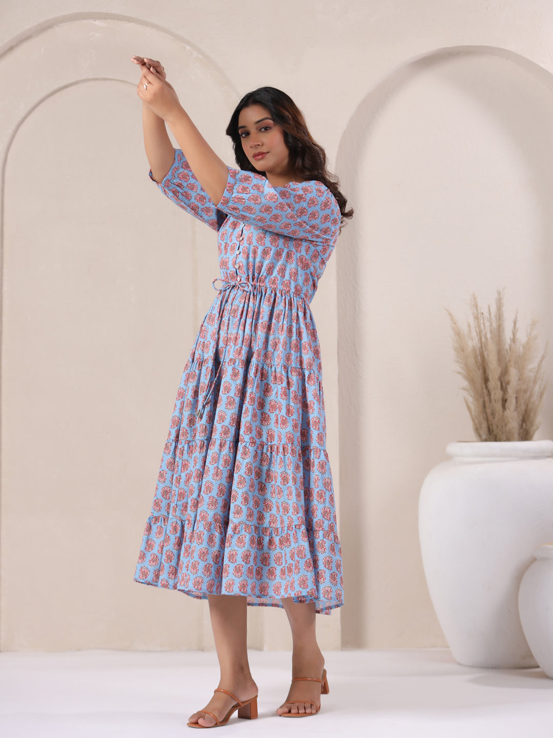 Waist detail of fit and flare paisley print cotton maxi dress