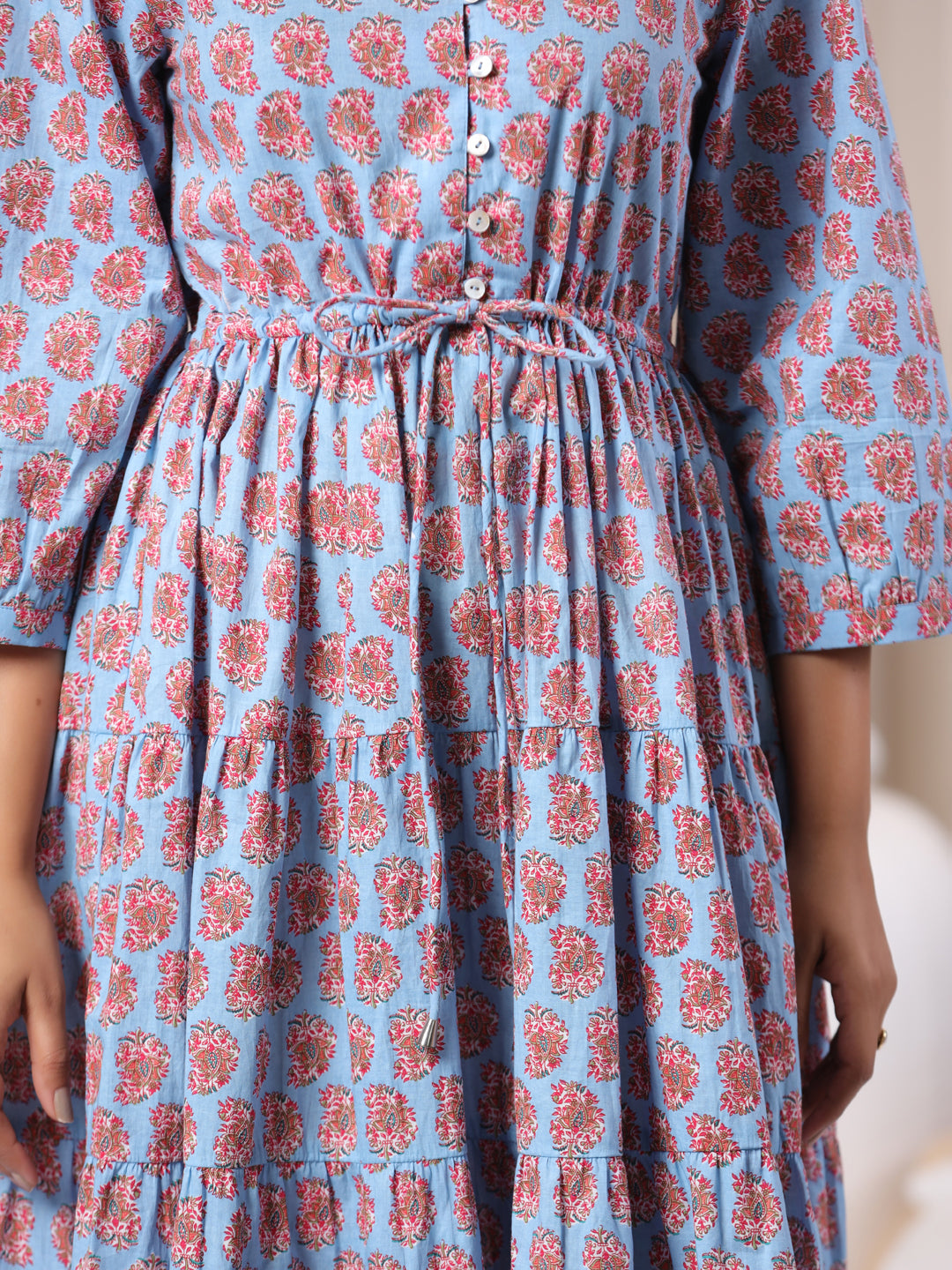 Close-up of paisley print detailing on powder blue cotton fabric & Print