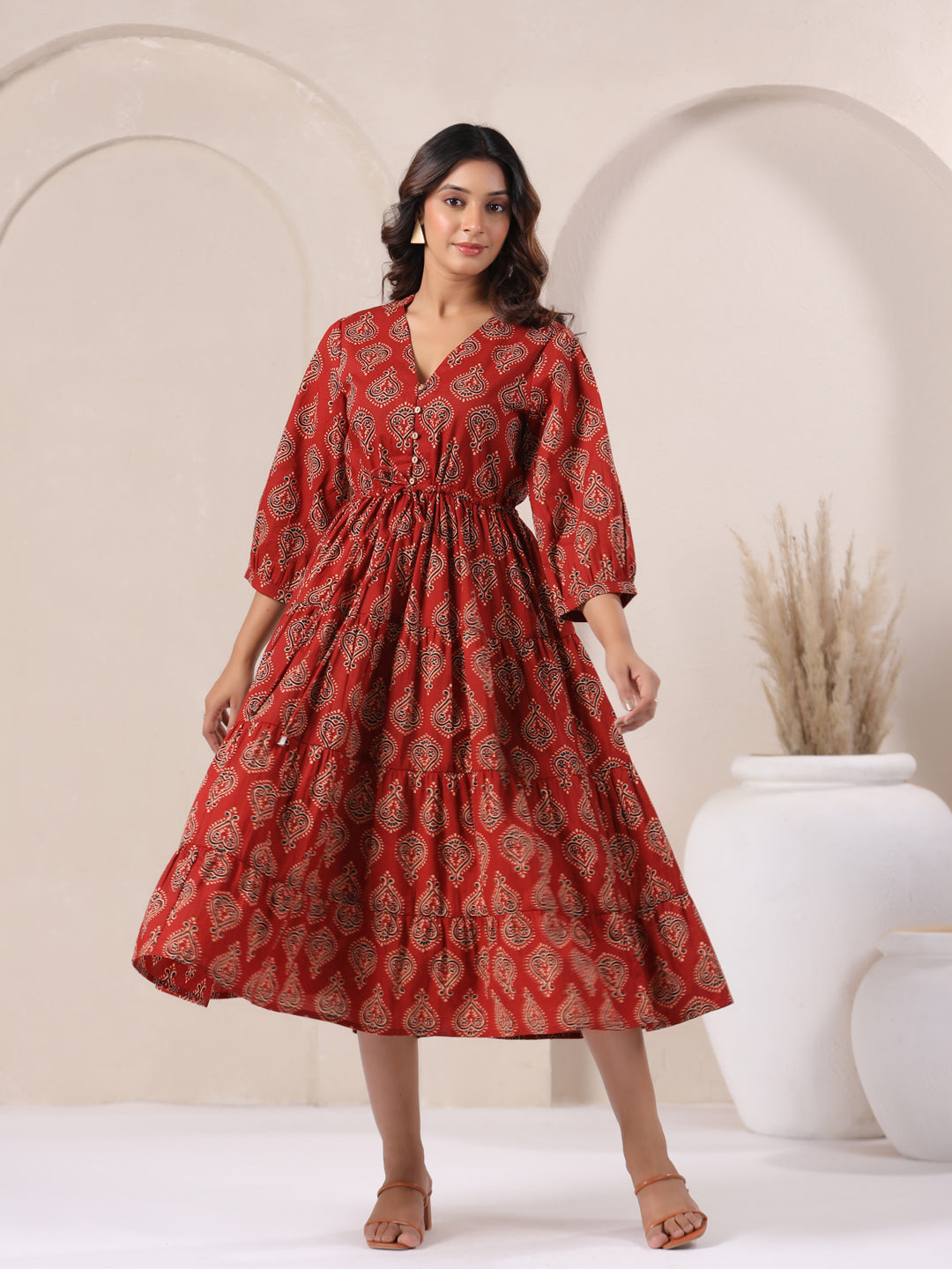 Model wearing red Ajrakh dress for casual summer wear in cotton fabric | Flowy view