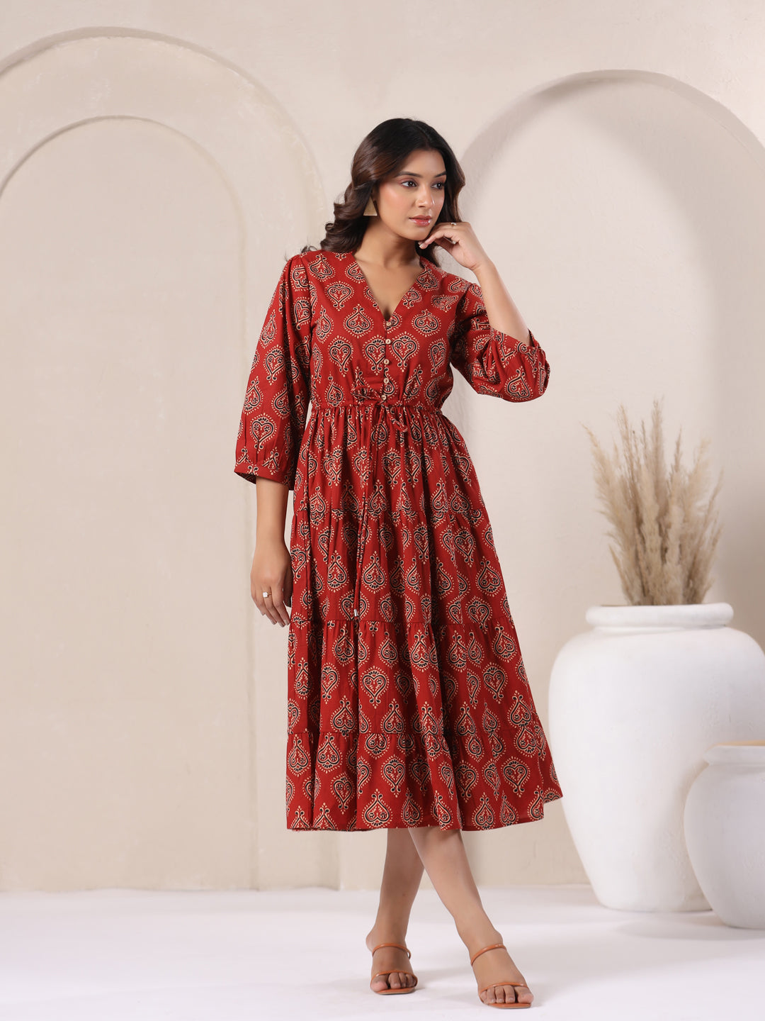 Front view of red Ajrakh print cotton maxi dress with fit and flare silhouette