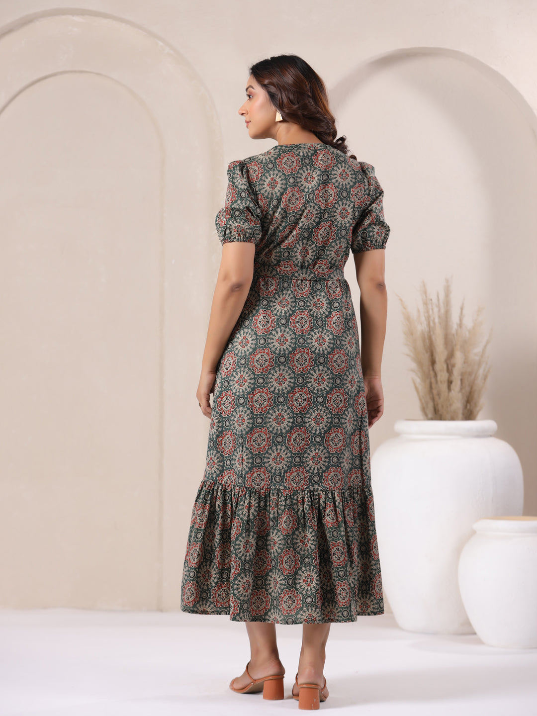 Back view of green Ajrakh print cotton bohemian maxi dress for women