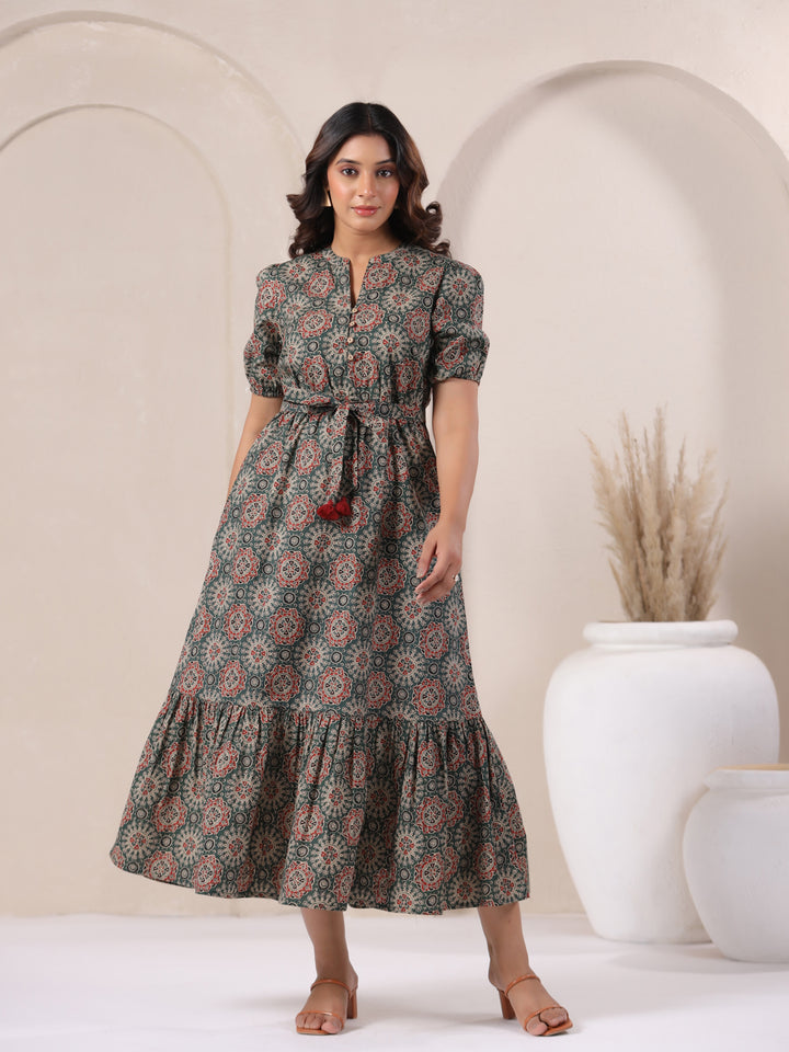 Front view of green Ajrakh print cotton long bohemian dress for women