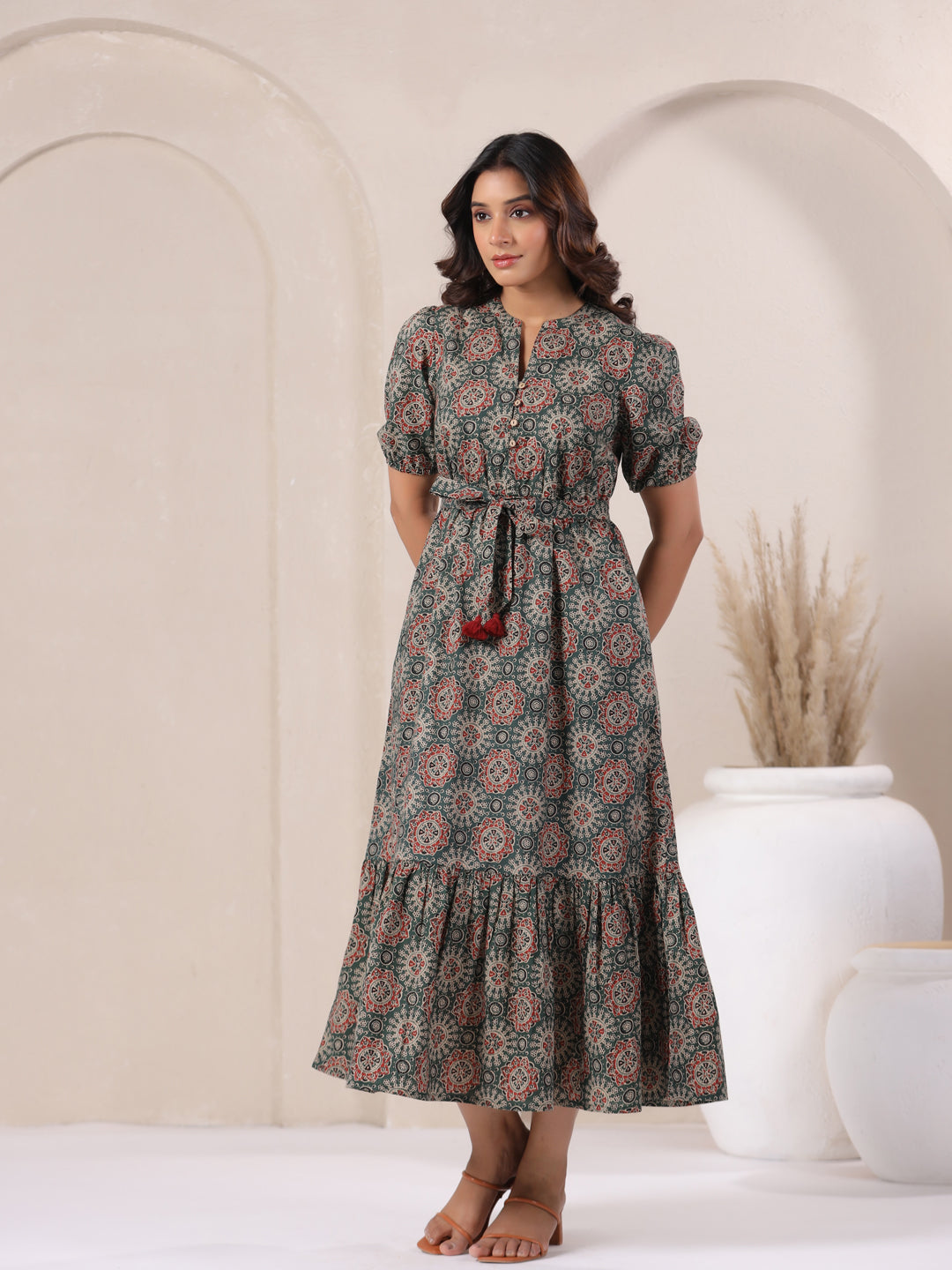 Front view style of green Ajrakh print cotton long bohemian dress for women