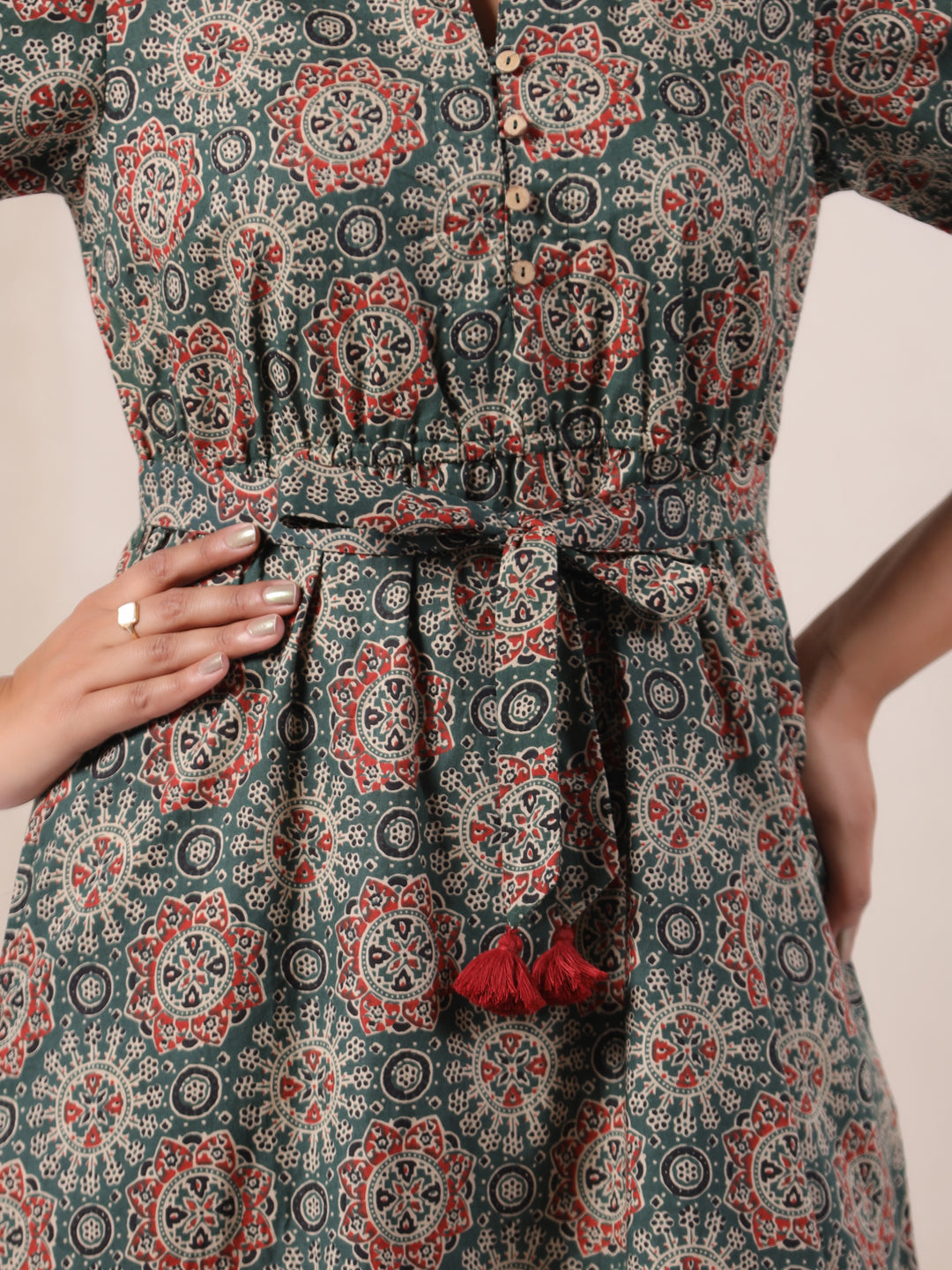 Detailed Ajrakh print design on green cotton bohemian dress for women
