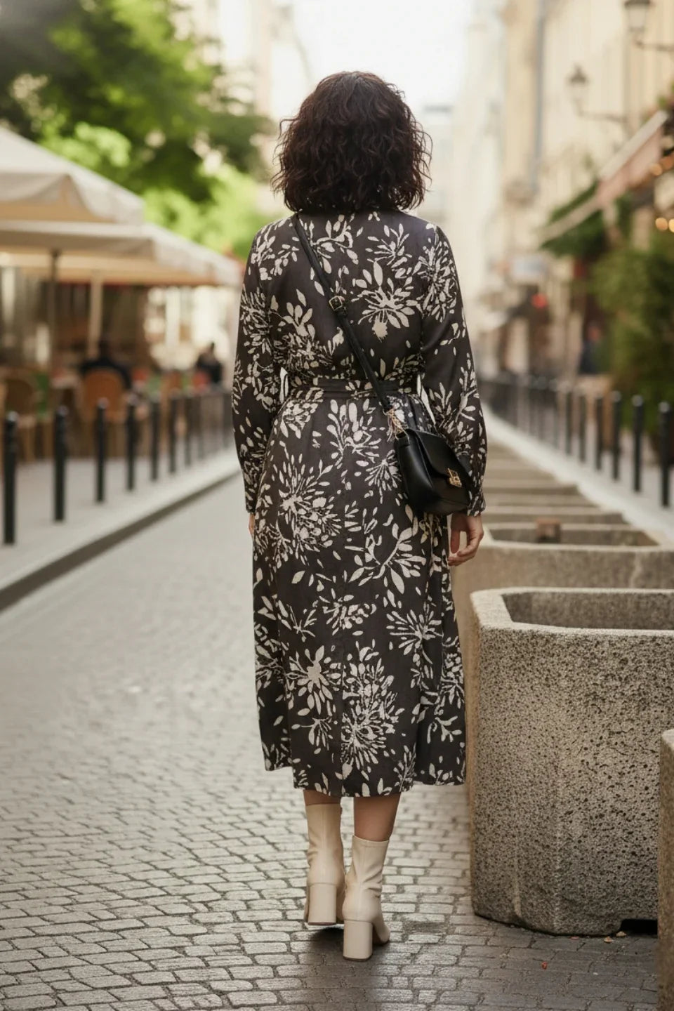 Women modeling a comfortable fit and flare gray maxi dress for summer occasions.