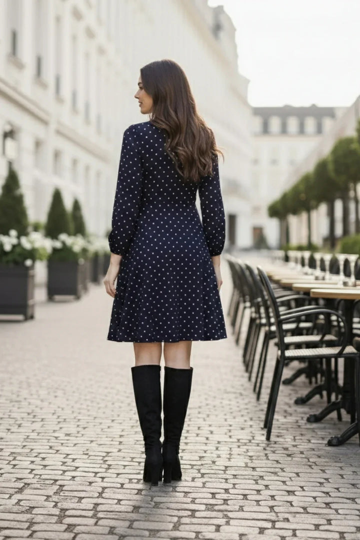 Back view of the comfortable polka dot skater dress from June 9 Clothing's collection.