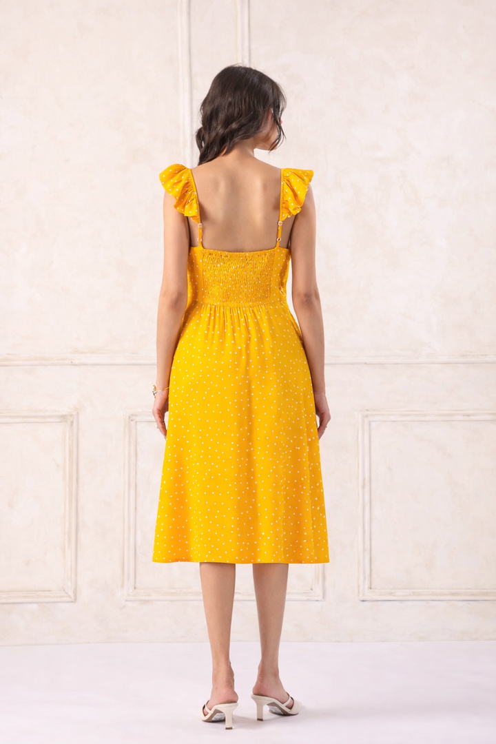 Yellow polka dot midi dress with ruffle straps and open back, chic Western wear for women