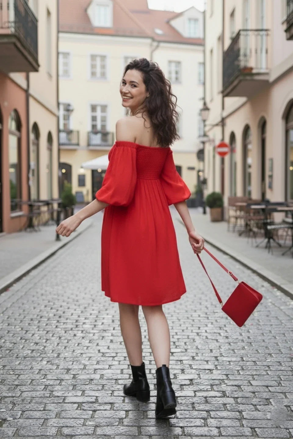 Red off-shoulder mini dress for women featuring smocked design | Backside view