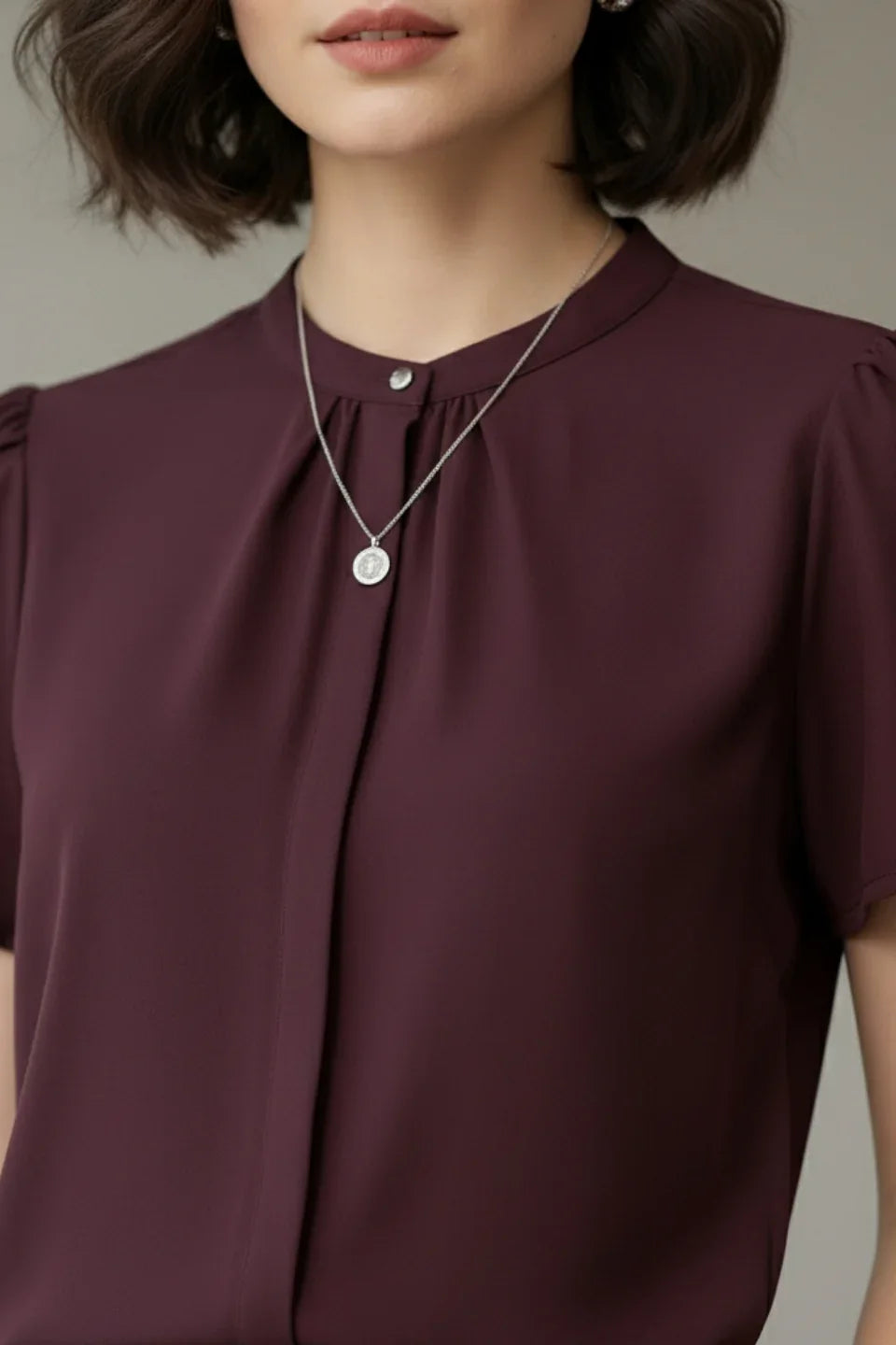 Close-up on the luxurious texture of the Moss fabric in Cardinal Red (June 9 Clothing).