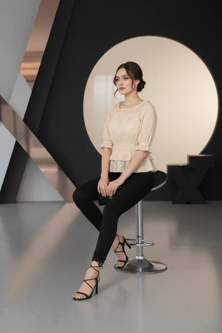 Side profile of the fitted Beige Seersucker Top, accentuating the waist detail (June 9 Clothing).