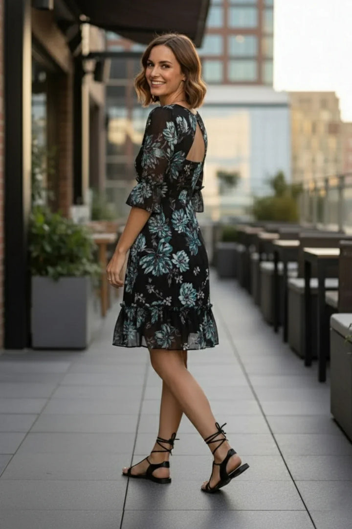 Lightweight Poly Knit blend black mini dress with vibrant blue floral print, June 9 Clothing.