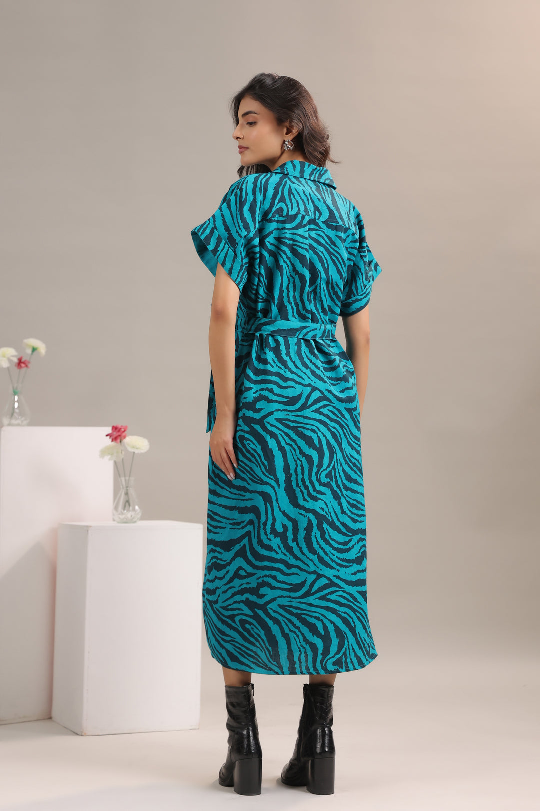Back view of model wearing Teal and Black Animal Print Midi Shirt Dress with Belt from June 9 Clothing