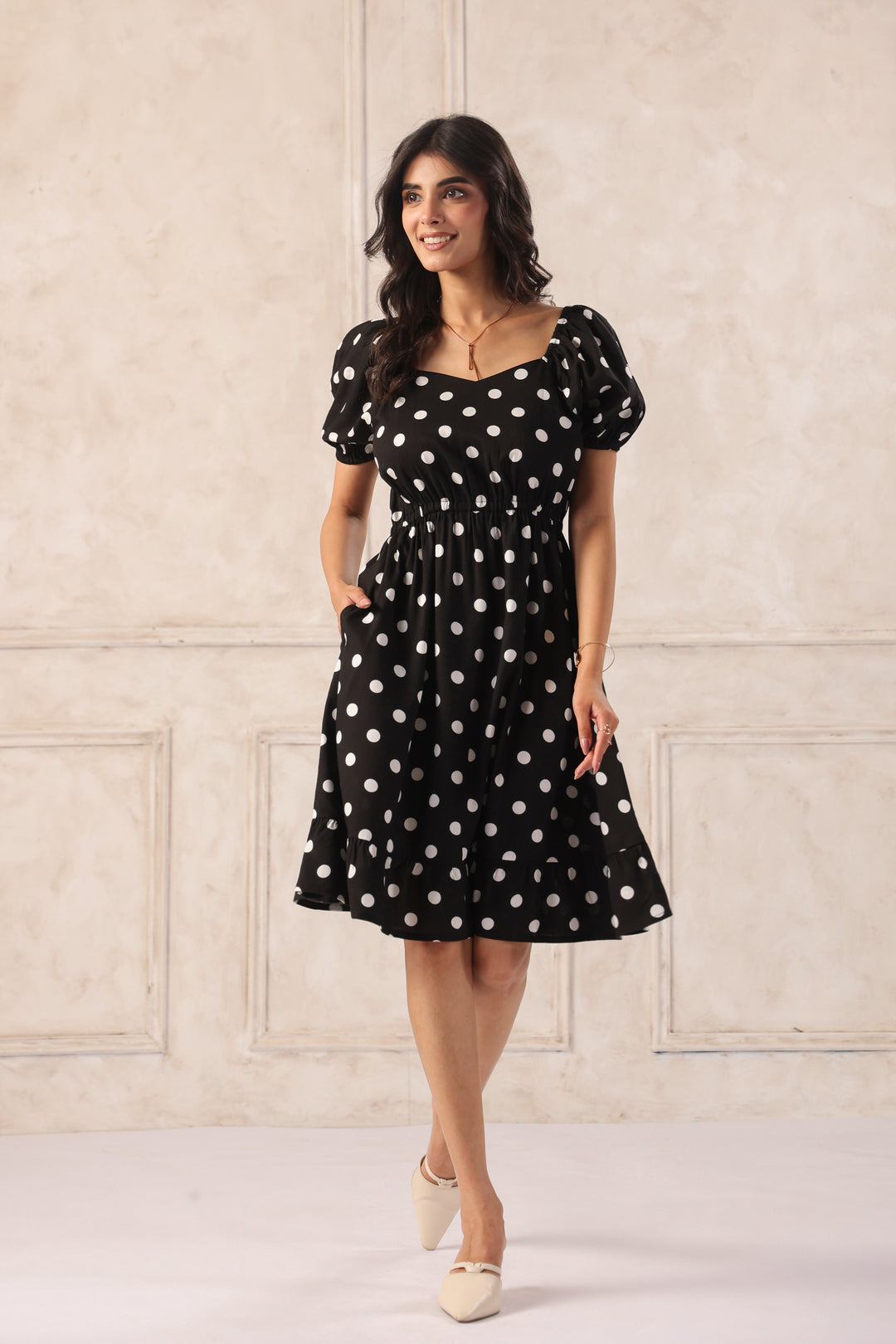 Black polka dot mini dress with sweetheart neckline front view women party wear dress