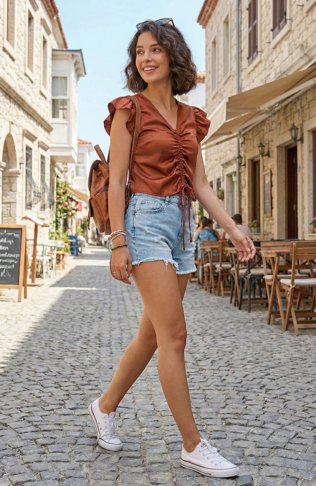 Side view of satin ruched polka dot crop top for women