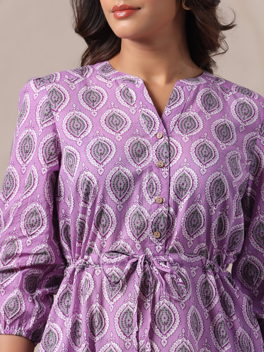 Close-up of breathable cotton fabric with lavender buti print detail