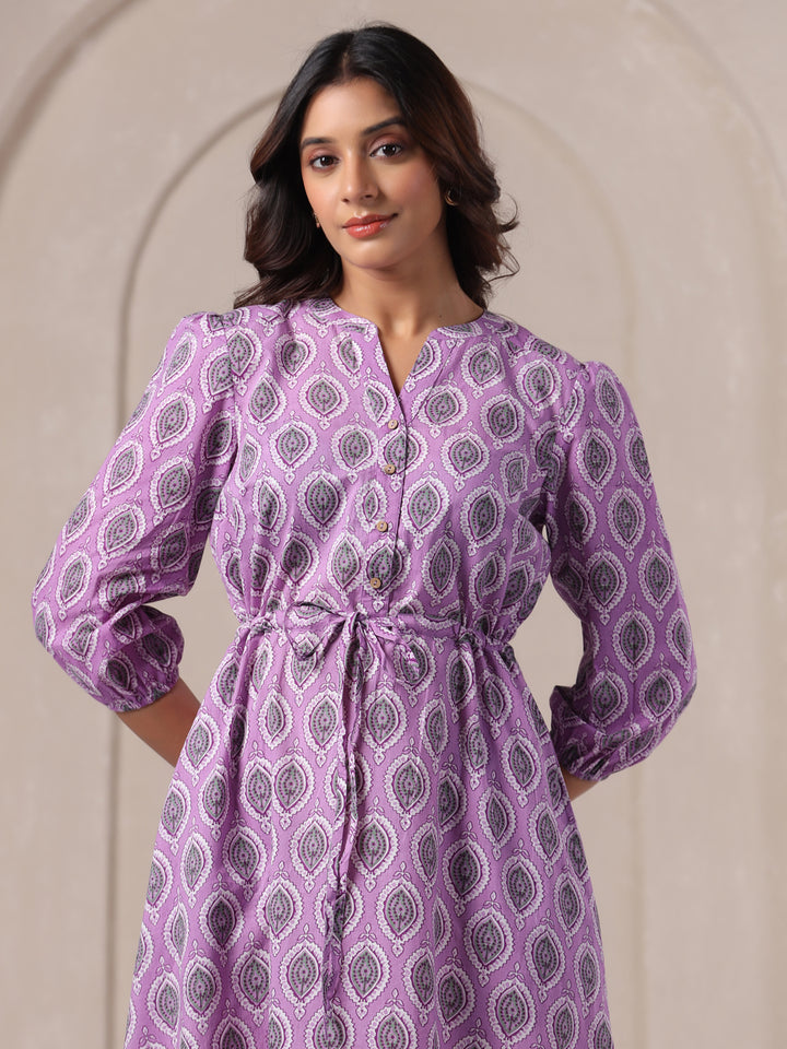 Close-up look of breathable cotton fabric with lavender buti print detail