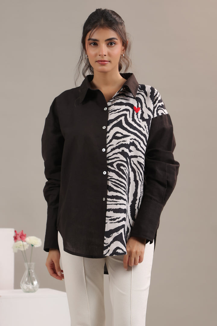 Detail of Fabric Pattern on Animal Print Shirt June 9 Clothing