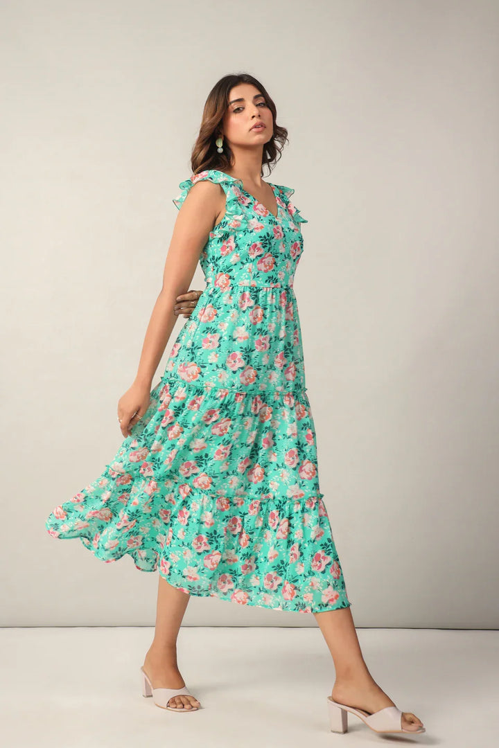 Model wearing a June 9 stylish midi dress for brunch or a summer casual occasion.