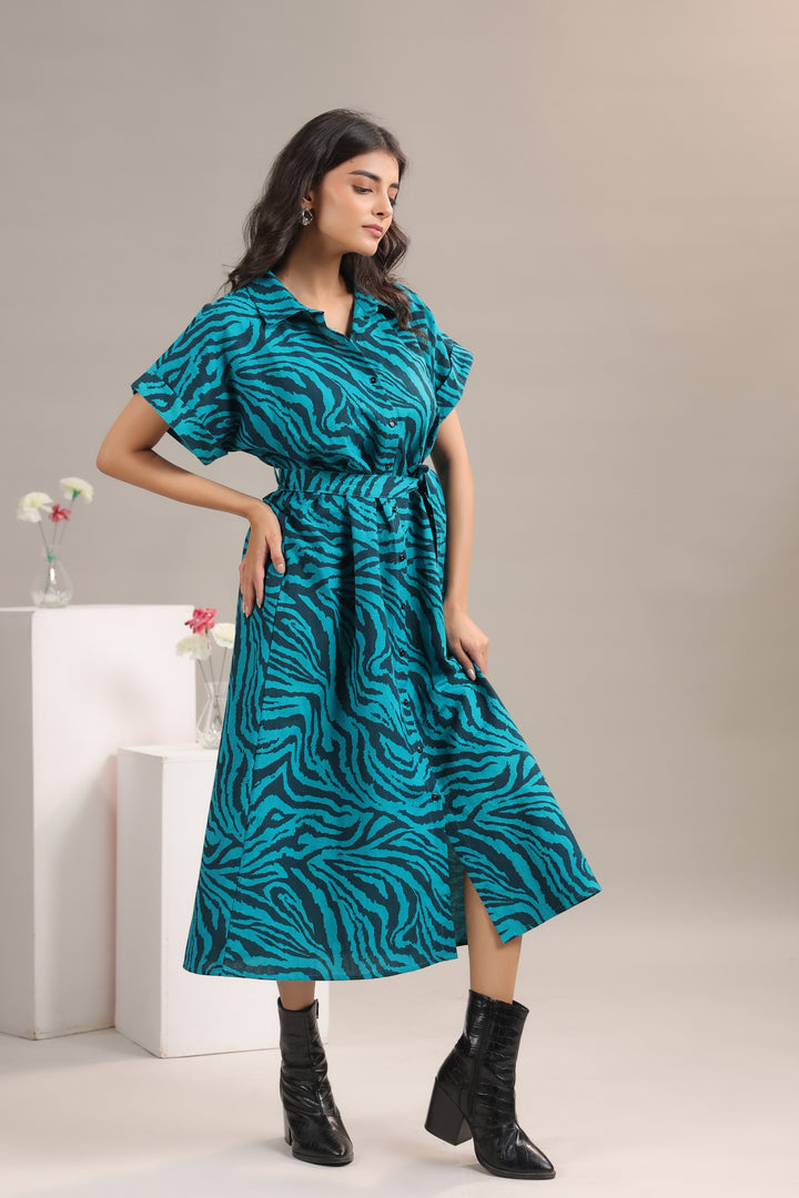 Flowy silhouette of Teal and Black Animal Print Midi Shirt Dress worn by model