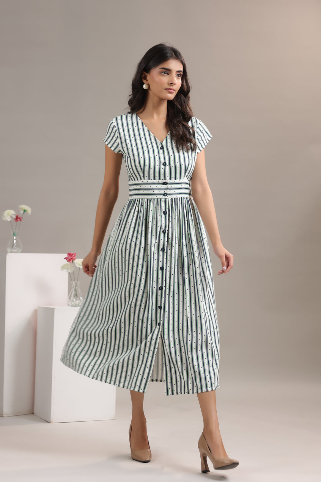Green striped midi dress for women with defined waist silhouette
