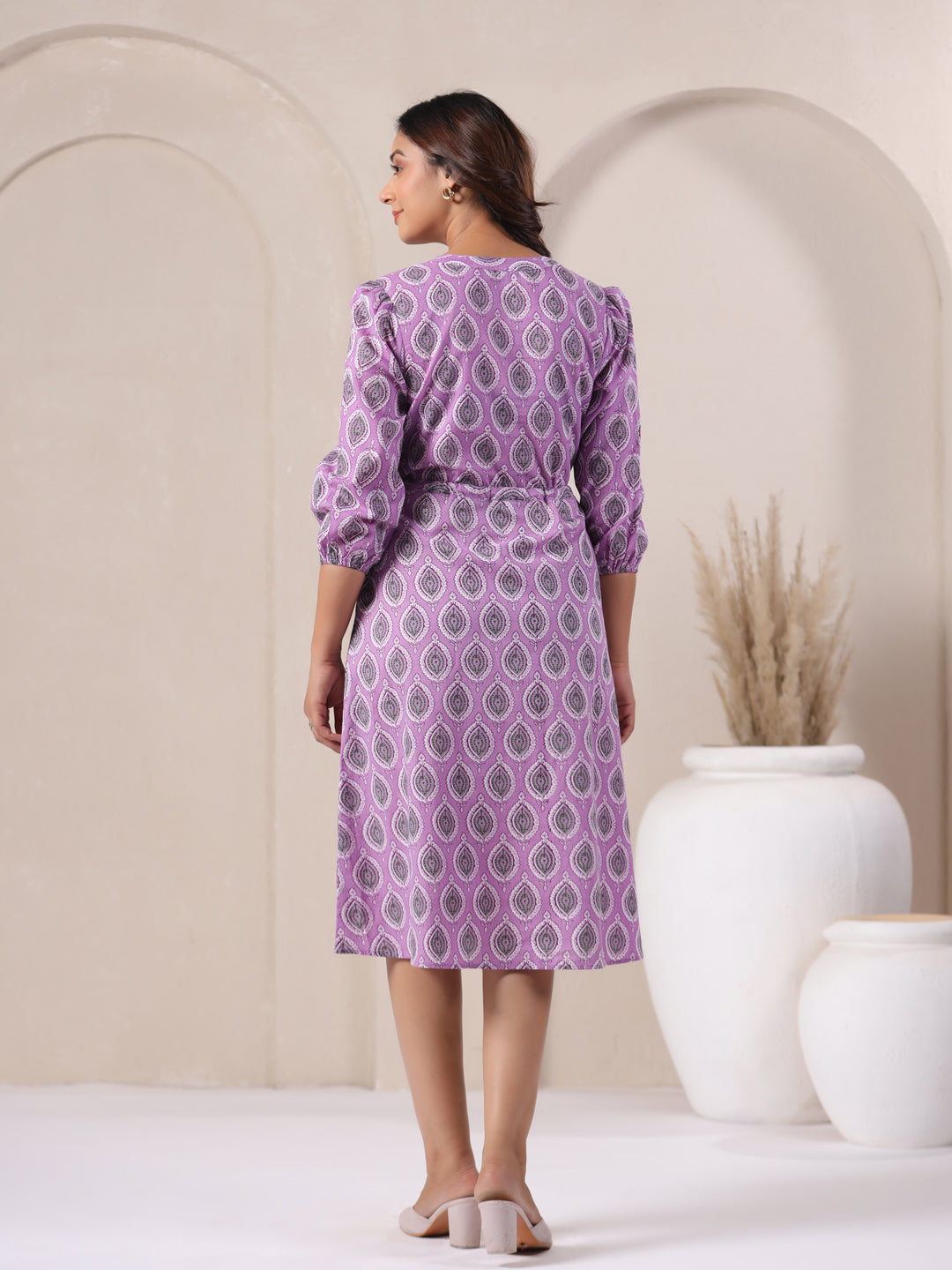 Back view of cotton midi dress in lavender shade with comfortable everyday silhouette