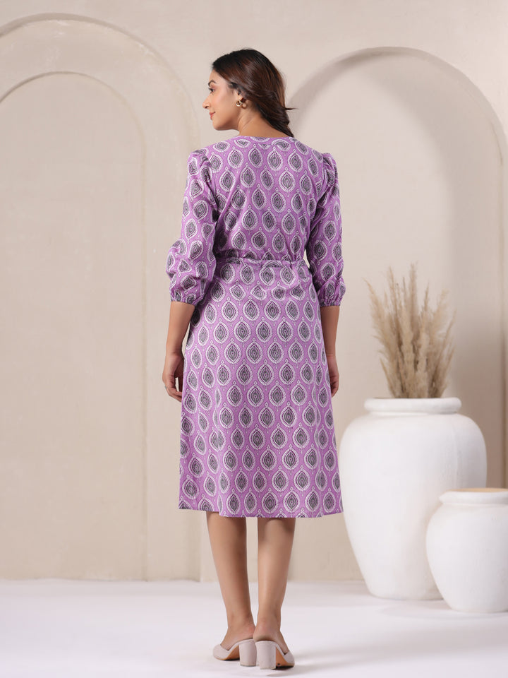 Back view of cotton midi dress in lavender shade with comfortable everyday silhouette