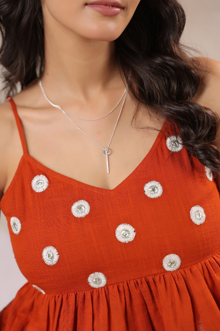 Close up rust peplum top embroidery detail cotton fabric women stylish top