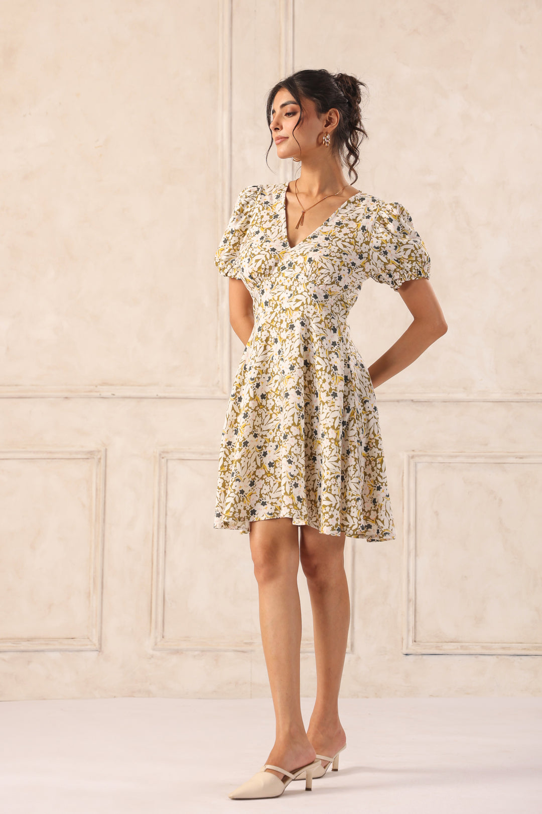 Floral print dress with puff sleeves and V-neck, paired with beige heels for Western wear style