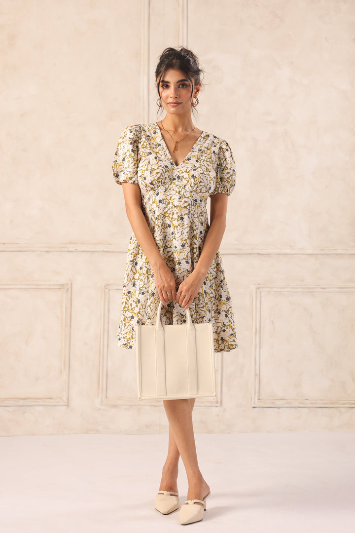 Floral Western dress with puff sleeves, paired with cream bag and heels for chic women's wear