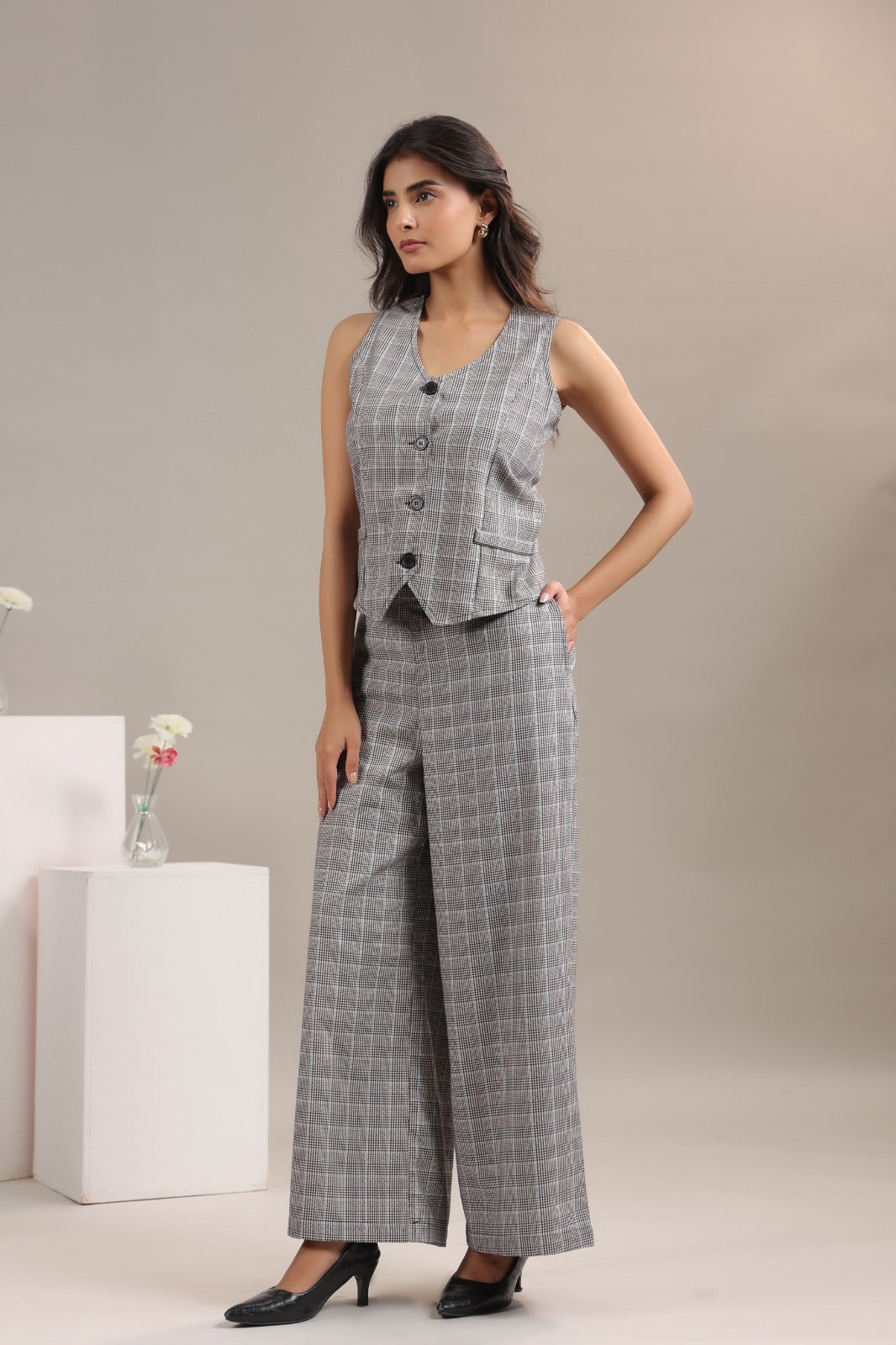 Side view grey checkered co ord set for women stylish vest pant formal look