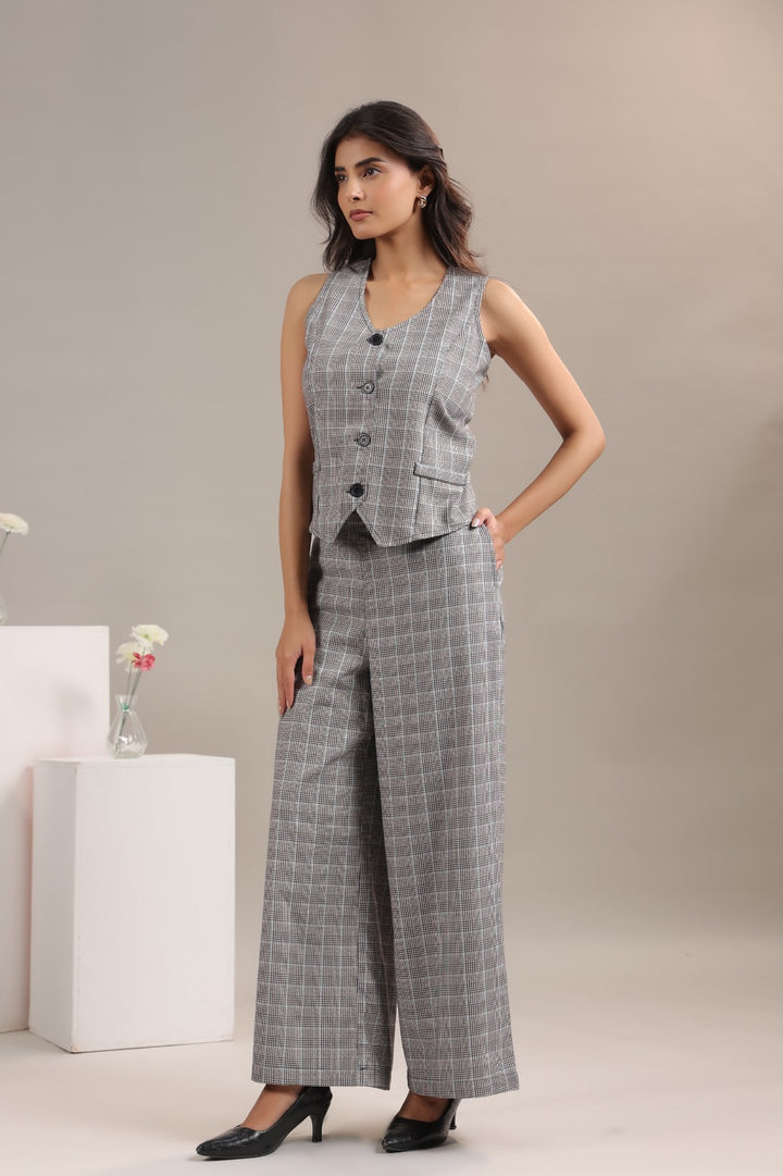 Side view grey checkered co ord set for women stylish vest pant formal look