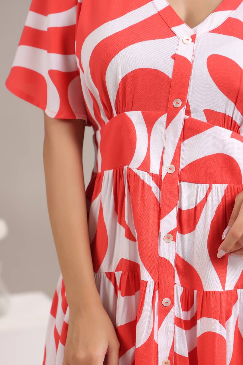 Close-up of red abstract pattern on womens mini dress