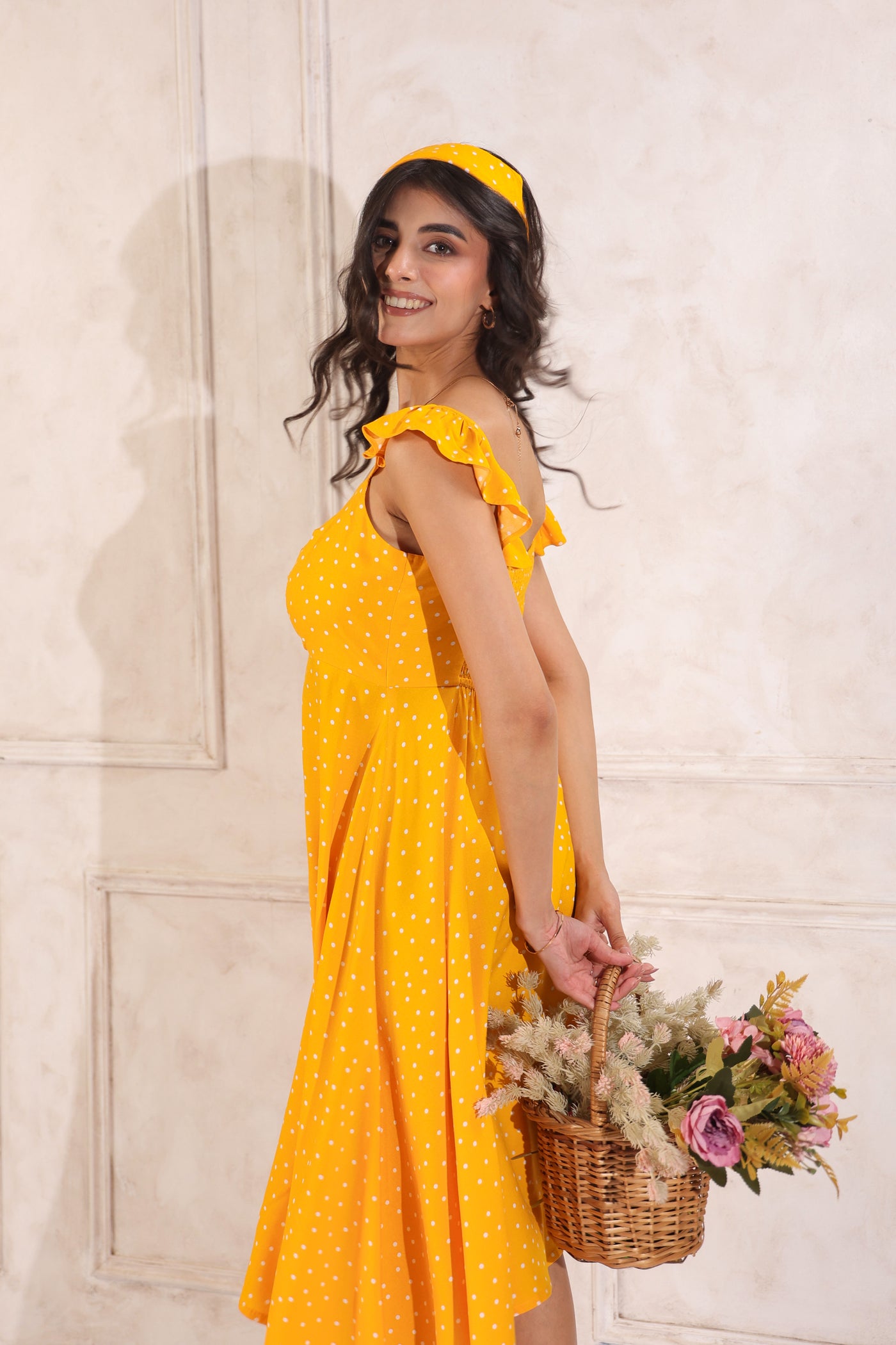 yellow midi dress sleeveless fit Side look by model
